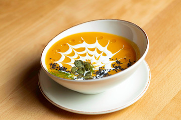 Pumpkin soup with cream and pumpkin seeds