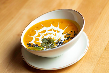 Pumpkin soup with cream and pumpkin seeds