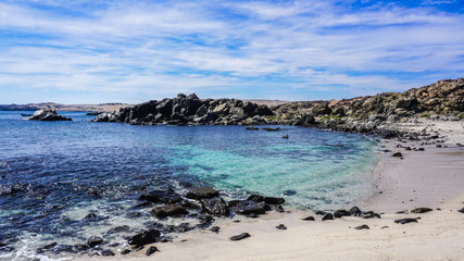 Chilean Coast with Beautiful Blue Waters, Waves and The Getaway (La Portada) Arch at the Pacific Ocean