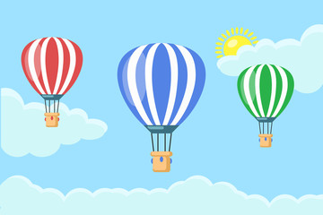 Hot air balloon in the sky with clouds isolated on blue background. Set of aerospace with basket. Flat cartoon design. Vector illustration.