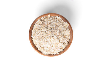 Pearl barley flakes isolated on white background.