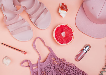Stylish feminime summer accessories of pastel pink color