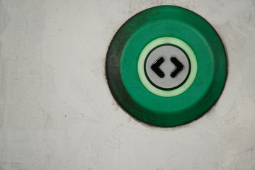 Sliding automatic door in train, open door dirty button with two arrow