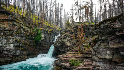 Exploring Glacier National Park in Montana with its Waterfalls, Landscape, Mountains and Forests 