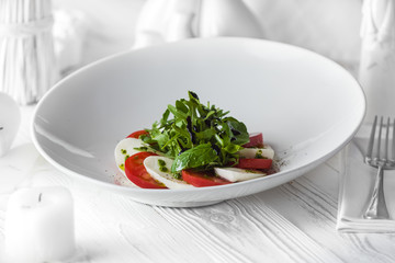 Fresh tasty salad made of tomatoes and cheese