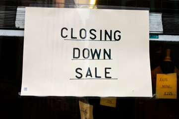 Closing Down Sign in Shop Window