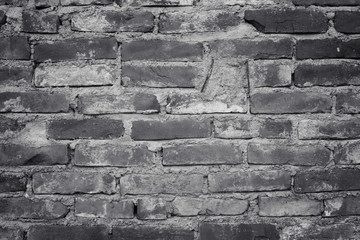 Black and white brick. Old brick wall, old texture of red stone blocks closeup. Wall texture. Copy space.