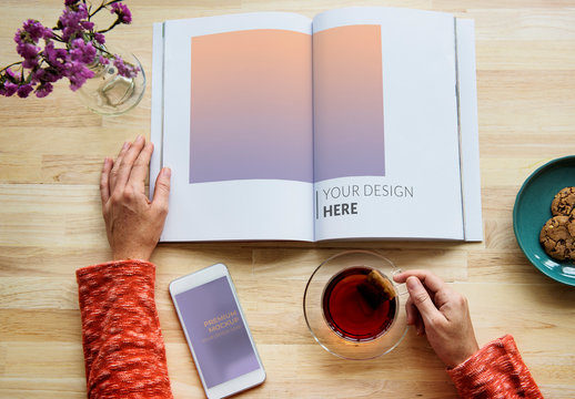 Top View Mockup of Smartphone User with a Book and Snacks