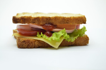 Ham and salad sandwich on white background