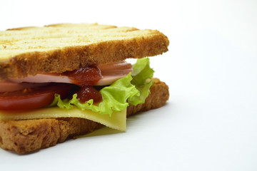 Ham and salad sandwich on white background