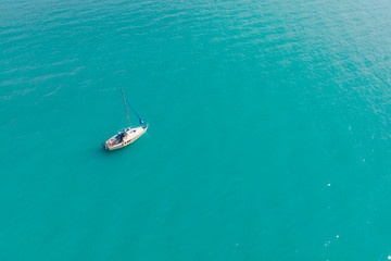 aerial view of boat in blue water