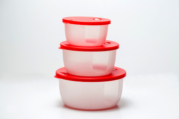 Plastic container for vegetables. White background.