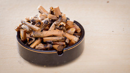 Cigarette Ends in Full Ashtray