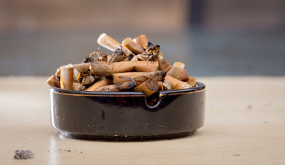 Cigarette Ends in Full Ashtray