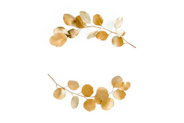 Gold round frame made of gold branches eucalyptus and leaves isolated on white background. lay flat, top view
