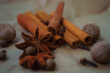 Spice on the table. Aromatic brown cinnamon stick