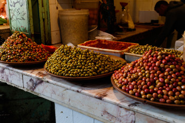 Dried fruit and nuts on market stall at the bazaar in Marrakesh, Morocco