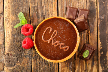 chocolate pie on wood background