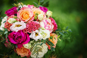 wedding table with floral arrangement prepared for reception, wedding, birthday or event centerpiece 