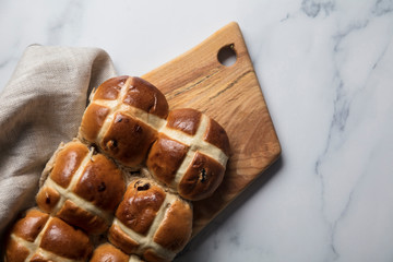 Traditional hot cross buns with raisins. Easter springtime treat