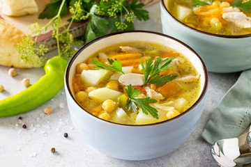 Homemade Hot Soup with Vegetables, Chicken and Peas Chickpeas. Eastern cuisine. The concept of healthy eating.