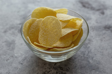 Crispy potato chips.The concept of fast food and snacks.