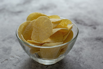Crispy potato chips.The concept of fast food and snacks.