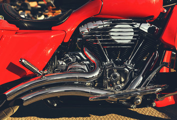 Fototapeta na wymiar V-shaped engine of red motorcycle