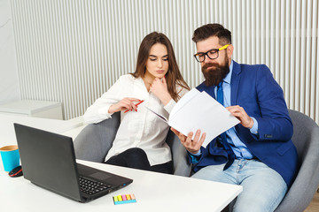 Business people in modern office. Have meetings, discussions and draw plans on a whiteboard. Photo...