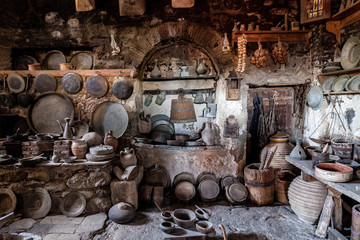 Old time village kitchen. Rustic cooking accesories in ancient pantry