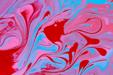 Abstract background of acrylic paint in blue and red tones