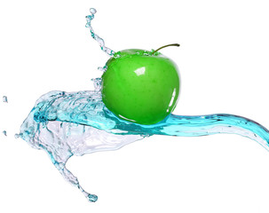 green apple in water stream