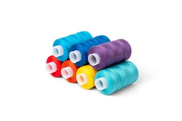 Coloured threads isolated on white background.