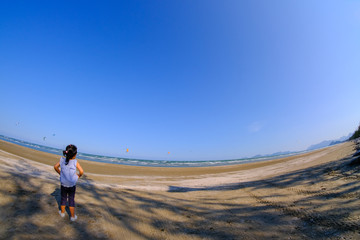 Sea Beach sky Parachute kid girl 