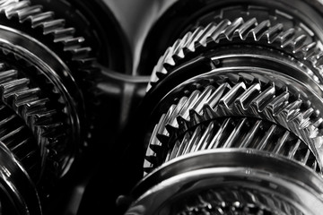 Full frame Industrial background - gear metal wheels in close-up ( selective focus).