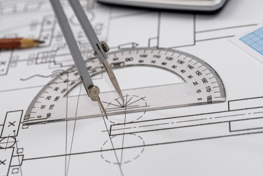 Drawing tool scale on technical sketch close up © RomanR