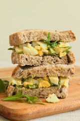 Eggs salad sandwich with mayonnaise and arugula