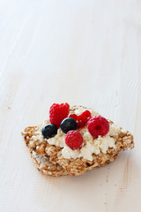 Cereral loaf of bread and fresh berries