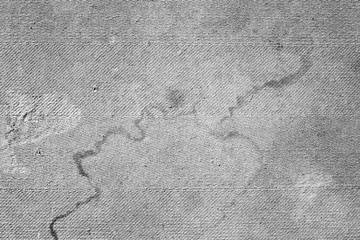 Old fibreboard with crack and stains. Texture background