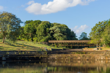Landscape with bridge, river and trees