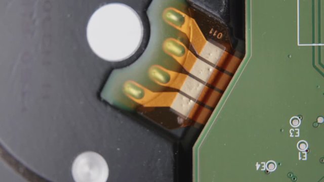 Cicuit Board with Lettering and Pins CLOSE UP PAN RIGHT