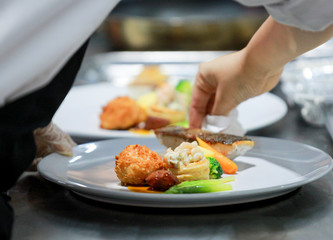 Chef preparing food, meal, in the kitchen, chef cooking, Chef decorating dish