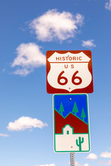 Route 66 sign under clear blue sky