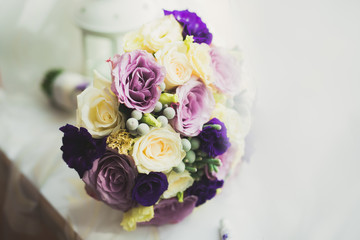Wonderful luxury wedding bouquet of different flowers
