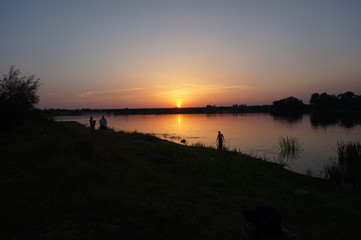 Fototapeta na wymiar Sunset on river