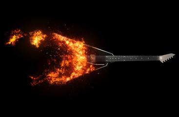 Black heavy metal guitar bursting into flames