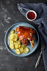 leg of pork  with potatoes