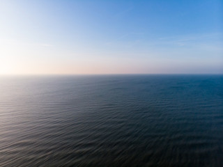 Curonian Spit and the Baltic Sea. View from the copter. Coastline with the beach and the sea. Nature conservation. View from the sky. The photo was taken by drone quadcopter.