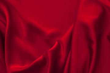 Naklejka na ściany i meble Luxury red satin fabric cloth abstract background