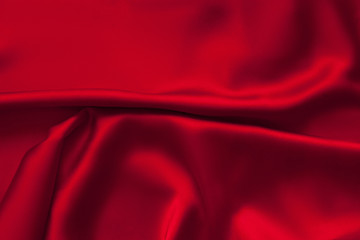 Naklejka na ściany i meble Luxury red satin fabric cloth abstract background